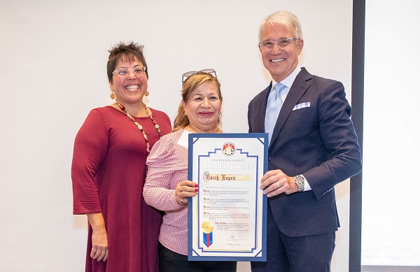 California Labor Commissioner Lilia Garcia-Brower, honoree Edith Lopez and District Attorney Gascón 