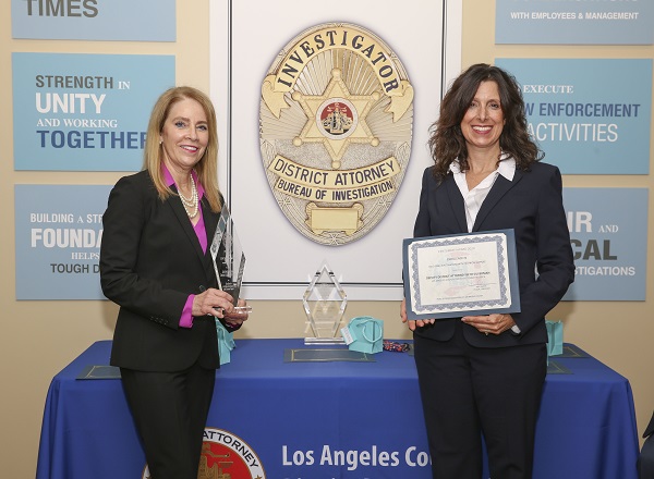Deputy District Attorneys Marguerite Rizzo and Beth Silverman with awards 